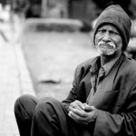 man in sock cap on street