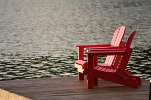 red chair near lake
