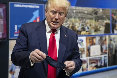 Judge orders Trump off Illinois primary ballot but puts ruling on hold