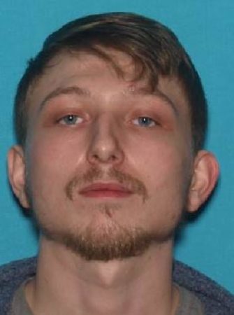 Arrest warrant issued for assault suspect.
