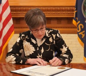 Kelly signs bill to help Kansans living with a disability save for the future