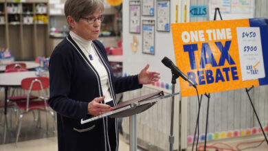 Photo of Kansas Governor announces tax rebate after vetoing flat tax proposal