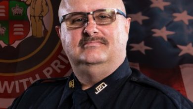 Photo of Detective Chip Root retiring from JPD after two decades
