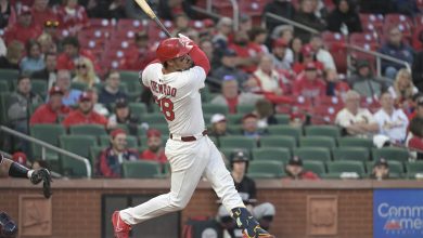 Photo of Arenado homers and Gray pitches Cardinals past Twins 5-3 in rain-delayed opener
